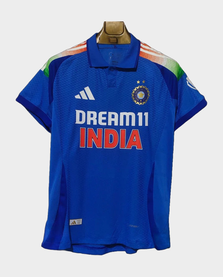 2025 India cricket jersey by Striker Store in blue with green and orange accents