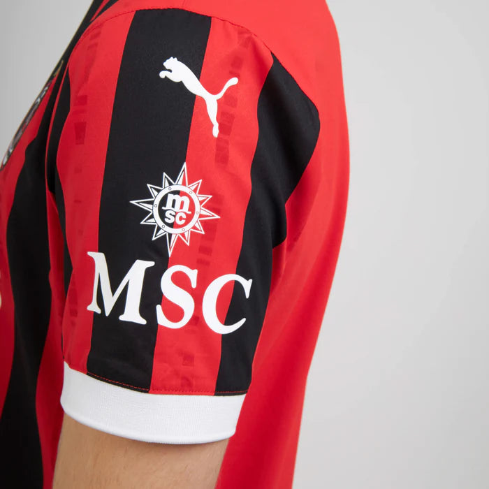 Striker Store AC Milan 2024 jersey featuring bold red and black stripes with Puma logo and MSC branding