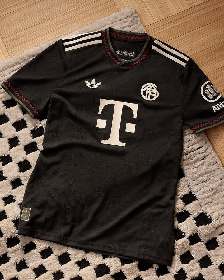 Striker Store black Adidas style Bayern Munich third jersey 2025-26 with white sponsor logo and red trim