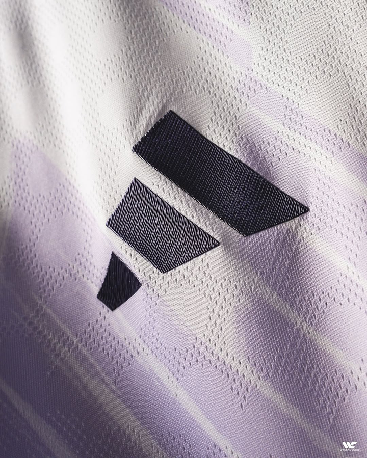 Close-up of Striker Store Manchester United away jersey 2025-26 with detailed fabric and logo stitching