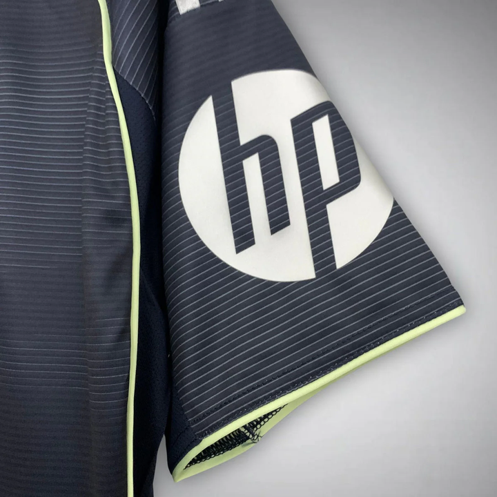 Real Madrid away jersey 2025 26 sleeve detail with hp logo and thin horizontal stripes from Striker Store