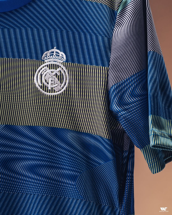 Real Madrid pre match jersey 2025 in blue with white embroidered club crest by Striker Store