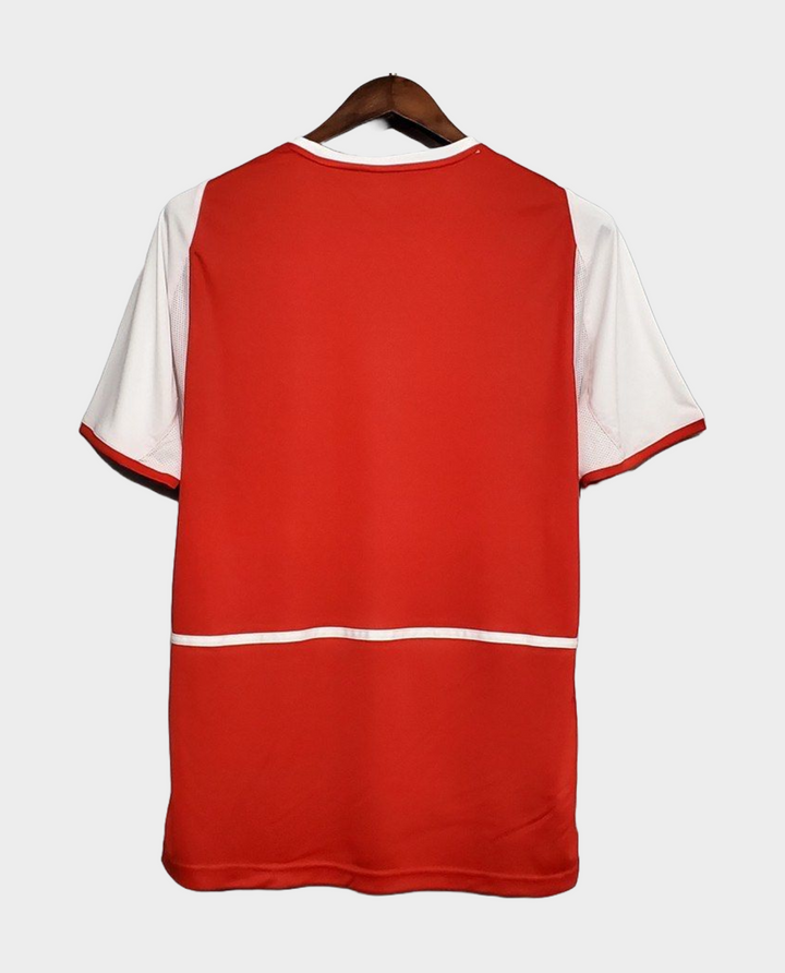 Back view of the 2004 Arsenal home jersey in red and white by Striker Store