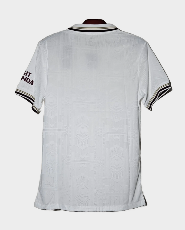 Back view of Arsenal 2025 26 third jersey in white with black and maroon trim from Striker Store
