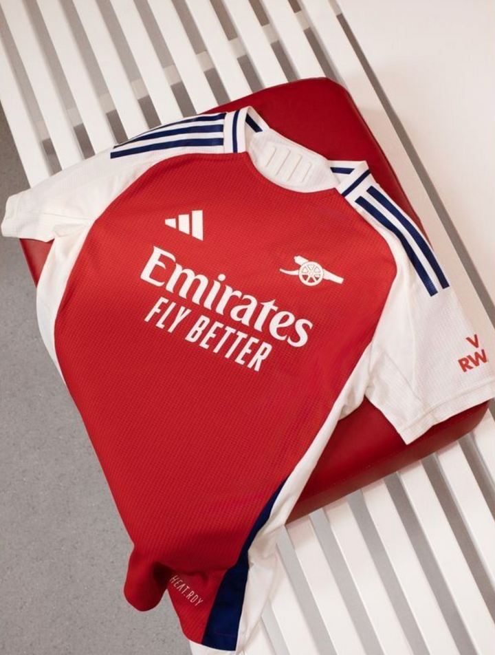 Arsenal home jersey 2024 player version with Emirates Fly Better logo in vibrant red and white