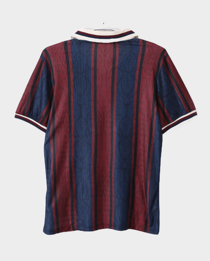 Barcelona 125th Anniversary Jersey 2025 featuring a classic striped design in maroon and blue