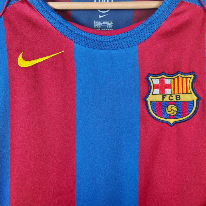 Barcelona 2004-05 retro jersey featuring the iconic red and blue stripes and club crest