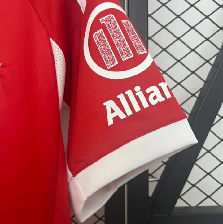 Close-up of the Bayern Munich 2025-26 home jersey sleeve featuring Allianz logo