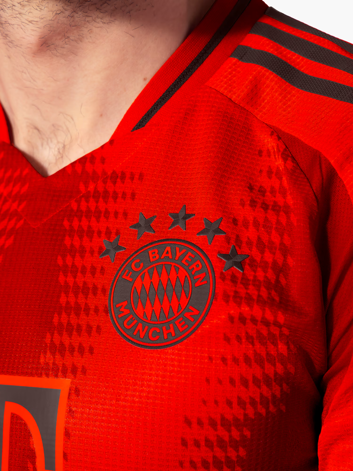 Close-up of Bayern Munich Home Jersey 2024 with logo and vibrant red design details