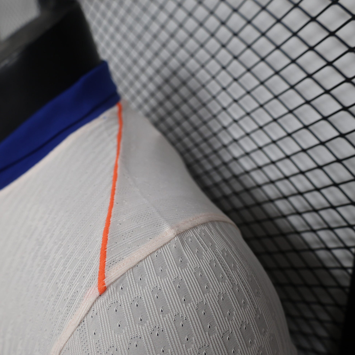 Close-up of Chelsea away jersey 2024 detailing with breathable fabric and vibrant colors