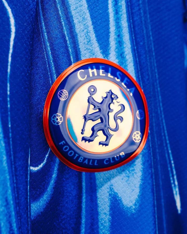 Close-up of Chelsea home jersey 2024-25 badge featuring the iconic club crest
