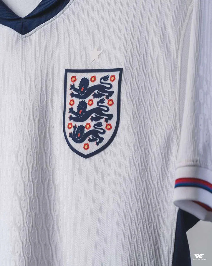 Striker Store England player jersey 2024 featuring iconic crest and detailed fabric design
