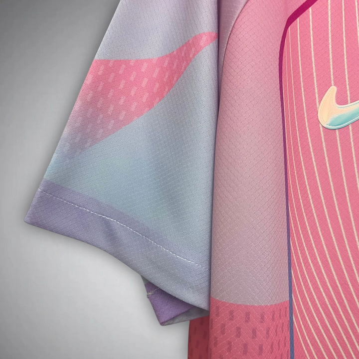 Close-up of FC Barcelona Pink Jersey 2025 sleeve showing light purple and pink fabric with Nike logo