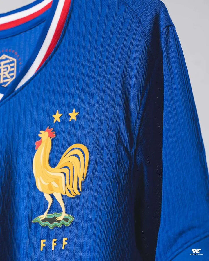 France Home Jersey 2024-25 featuring a blue design and iconic rooster emblem