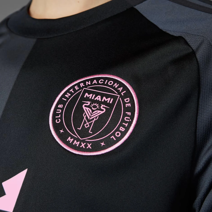 Inter Miami away jersey 2025-26 featuring the club logo in vibrant pink on a black background