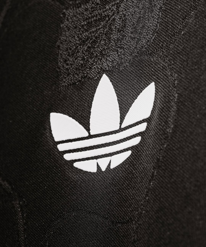 Close-up of the Striker Store Juventus 25-26 third jersey featuring Adidas logo detail
