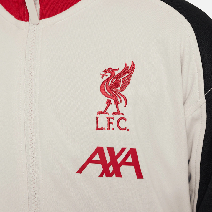 Liverpool FC 2025 home windbreaker featuring embroidered logo and AXA branding