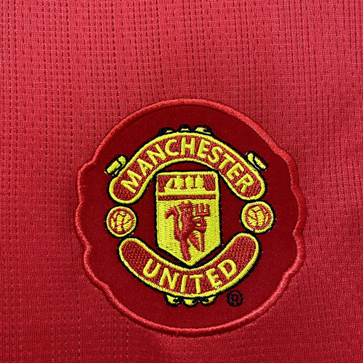 Close-up of the Manchester United 2007-08 Champions League jersey featuring the club's iconic crest