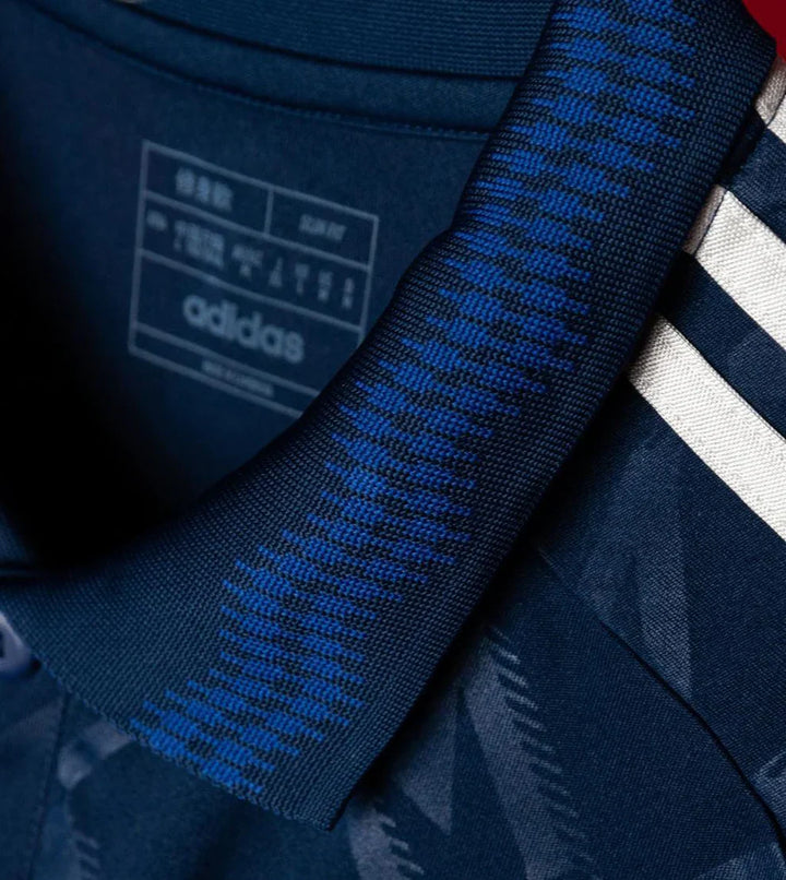 Close-up of the collar details on the Manchester United 2024-25 away jersey by Striker Store