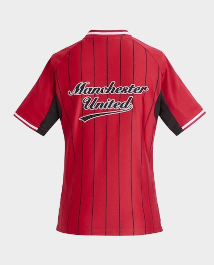 Back view of Manchester United special edition shirt 2025 in red with black stripes and logo