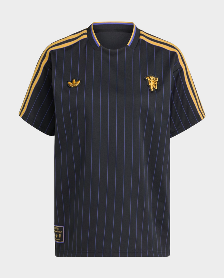 Striker Store Manchester United Terrace Icon jersey 2025-26 in navy with gold stripes and logo