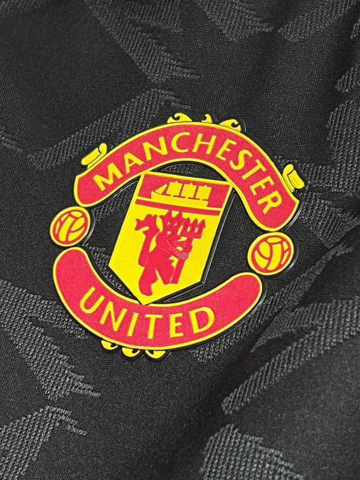 Close-up of Manchester United Third Jersey 2025-26 player version with embroidered club crest from Striker Store