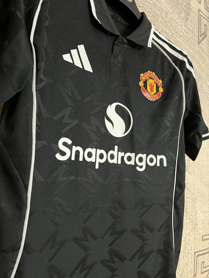Manchester United Third Jersey 2025-26 player version in black with Snapdragon logo and white stripes