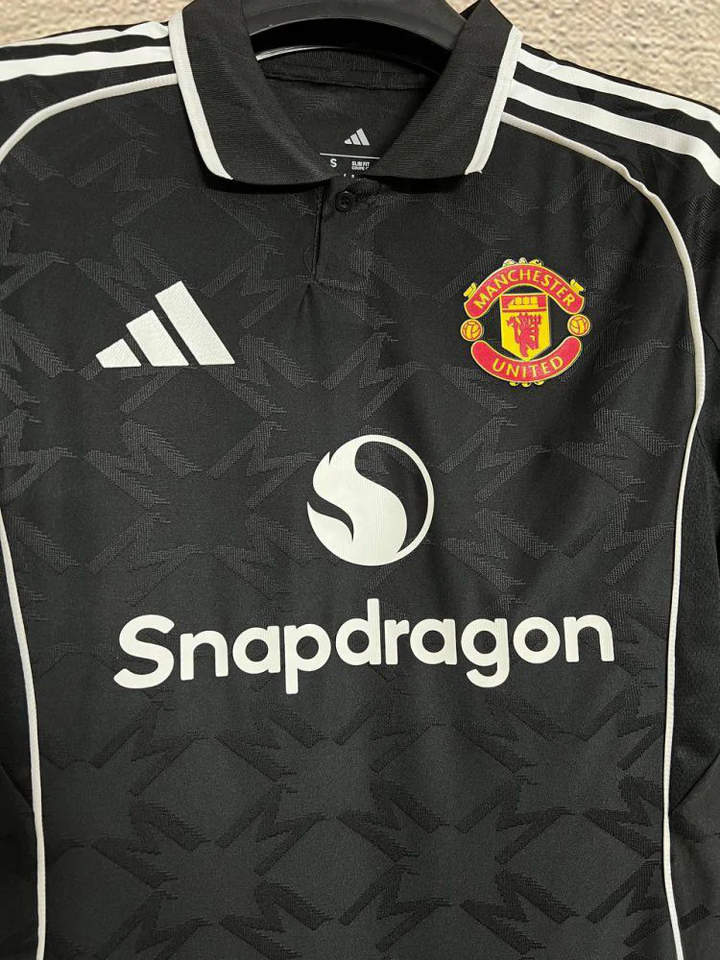 Manchester United Third Jersey 2025-26 player version in black with club crest and Adidas logo
