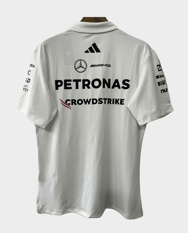 Mercedes AMG Petronas F1 white polo featuring sponsor logos on the back view