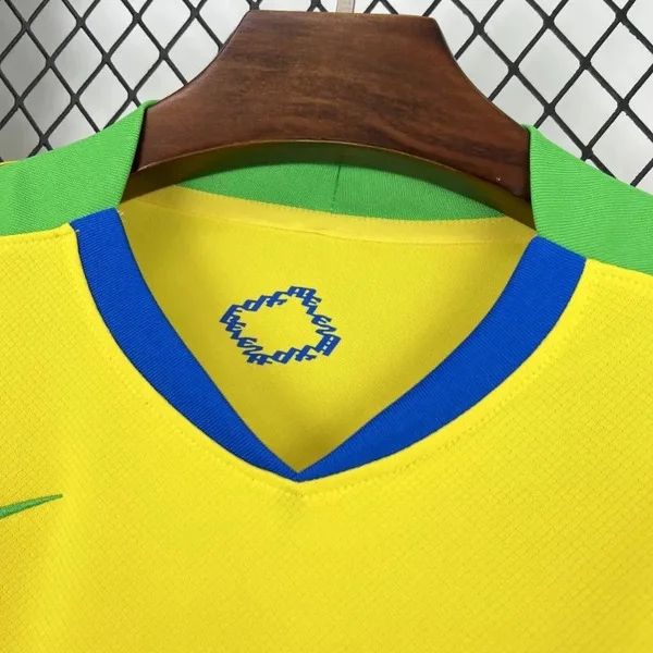 Close-up of Brazil 2025 home jersey featuring vibrant yellow fabric and blue accents