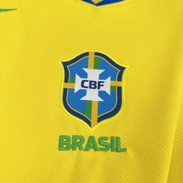 Close-up of Brazil 2025 home jersey featuring the iconic CBF badge and vibrant yellow color