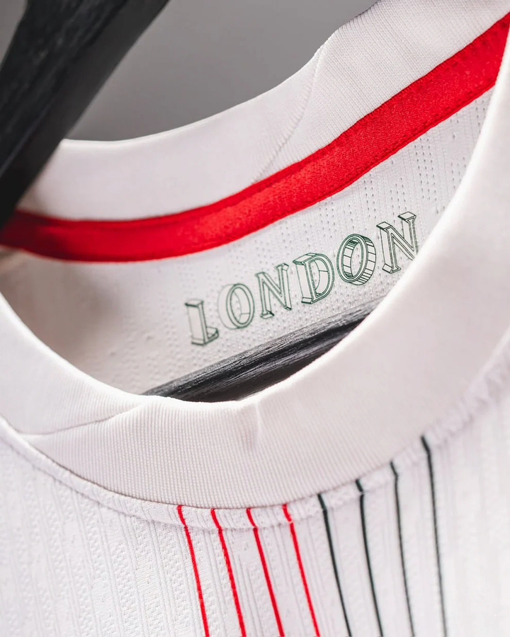 Close-up of Striker Store Chelsea away jersey 2025-26 collar with London text and red trim