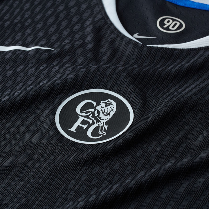 Striker Store close up of Chelsea Third Jersey 2025-26 Player Version black textured fabric with white CFC lion crest