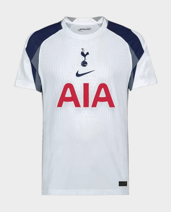 Striker Store Tottenham Hotspur 2025 home jersey white Nike shirt with navy shoulder panels and red AIA sponsor logo
