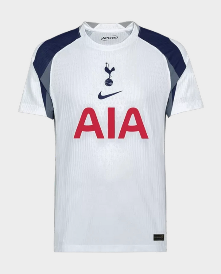 Striker Store Tottenham Hotspur 2025 home jersey white Nike shirt with navy shoulder panels and red AIA sponsor logo