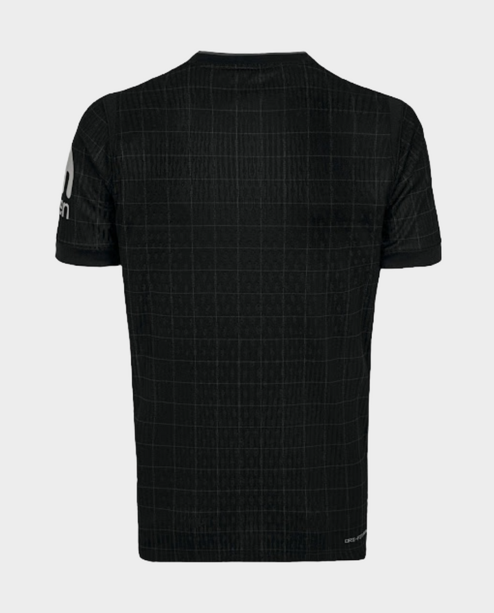 Back view of black Tottenham Hotspur away jersey 2025-26 with subtle grid pattern short sleeves by Striker Store