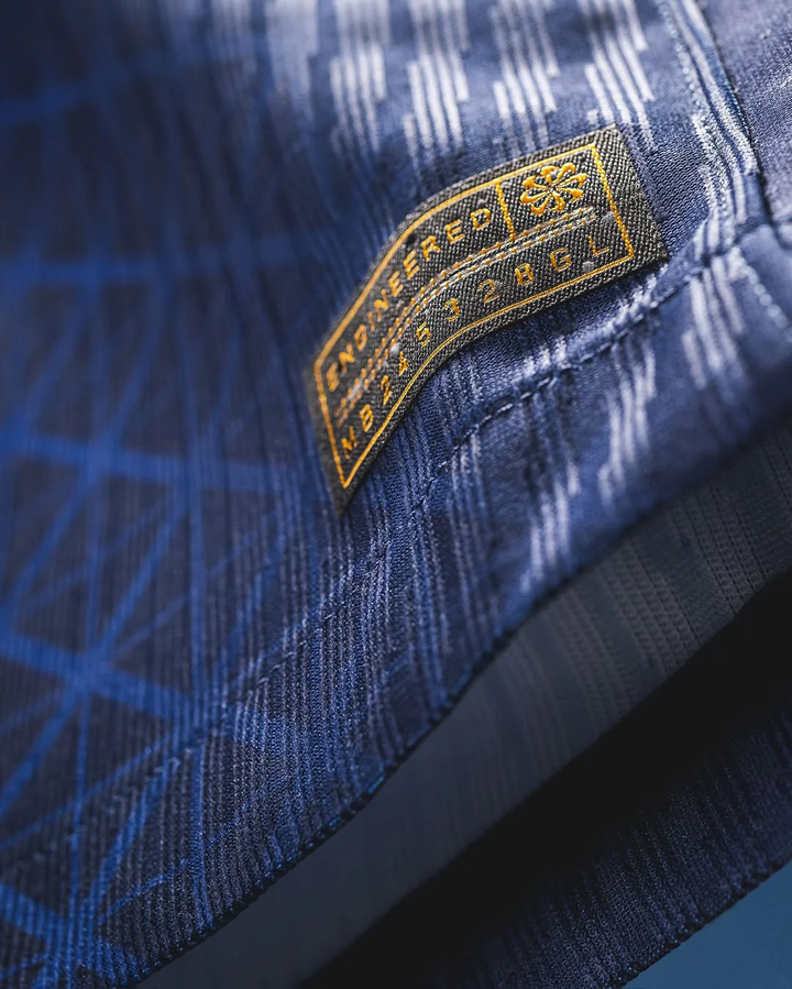 Close-up of Striker Store Paris home jersey 2025 Player Version showing unique stitching and authentication tag