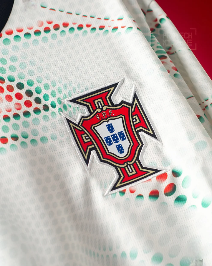 Close-up of Portugal Away Jersey 2025-26 Player featuring the team crest and unique design details