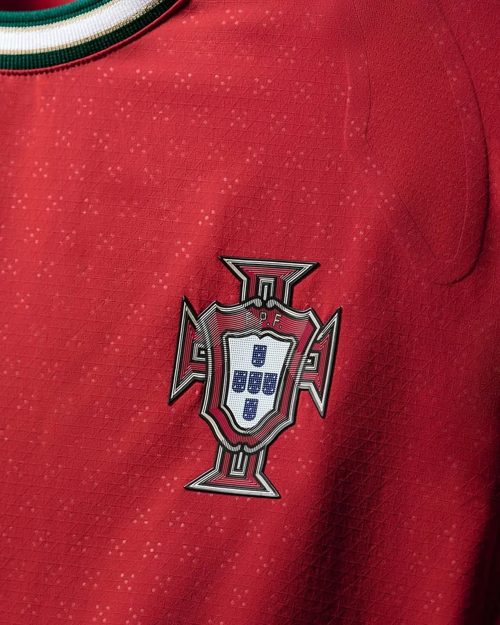 Close-up of the Portugal home jersey 2025-26 Player Version featuring the national emblem