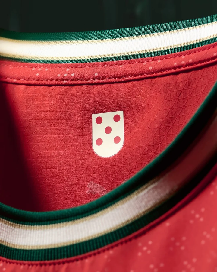 Close-up of Portugal home jersey 2025-26 Player Version collar with detailed logo design