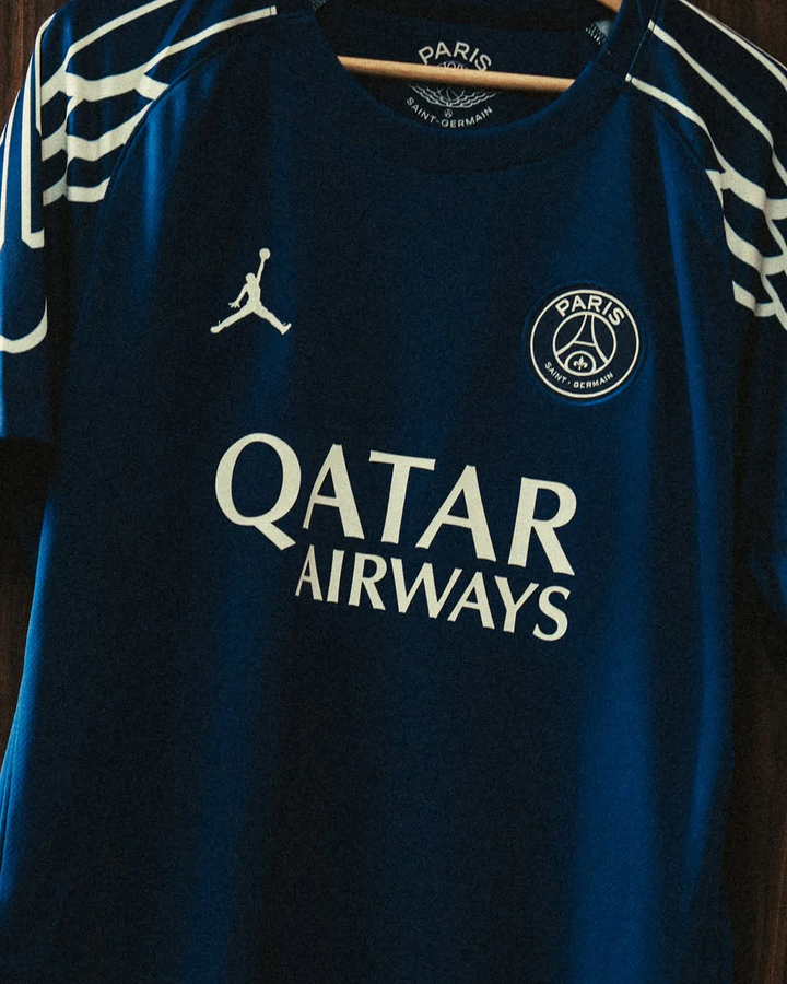 PSG 2024 fourth jersey in blue featuring the Qatar Airways logo and Jordan branding