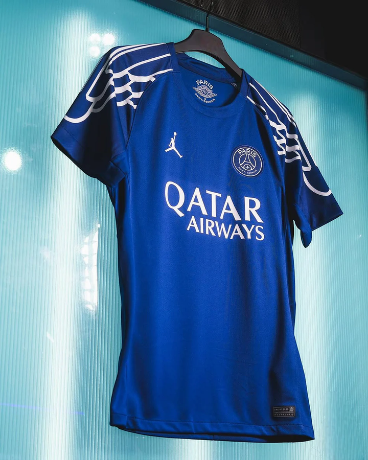 PSG 2024 fourth jersey in blue featuring the logo and Qatar Airways sponsorship