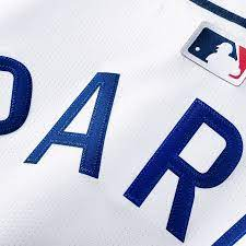 PSG special edition baseball shirt 2025 featuring vibrant navy lettering on a white background