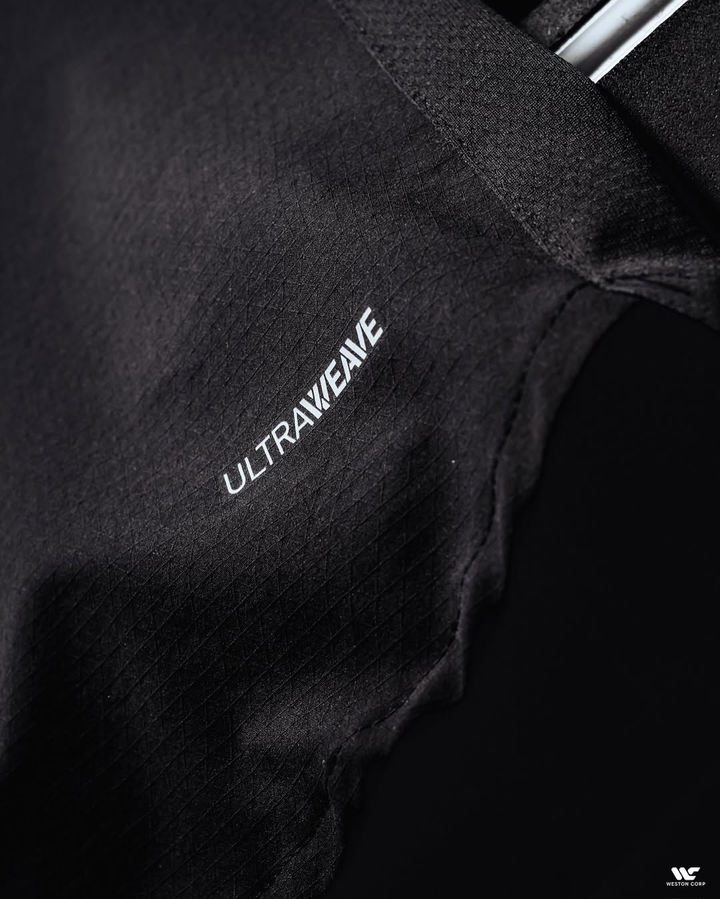 Close-up of Striker Store black Manchester City away jersey 2025 showcasing ULTRAVEAVE fabric texture