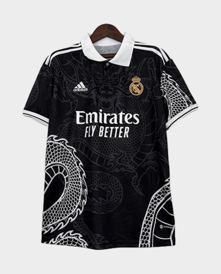 Real Madrid Black Dragon Jersey with intricate dragon design and Emirates sponsor logo