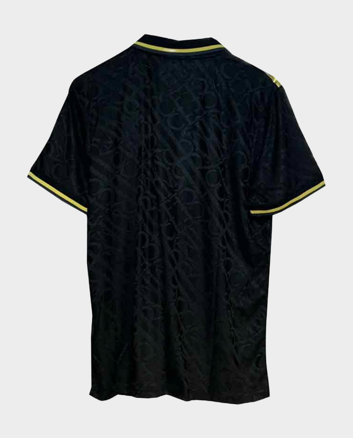 Back view of Real Madrid gold jersey 2023 featuring a stylish design and comfortable fit