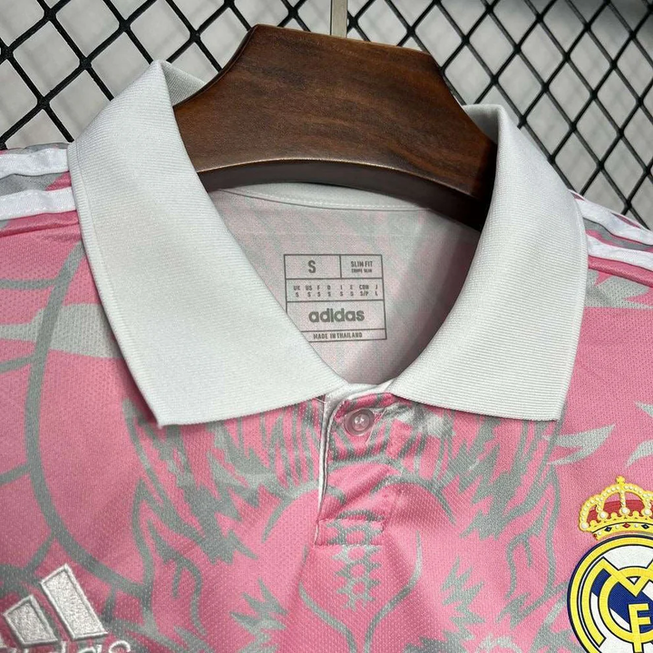 Striker Store Real Madrid pink dragon jersey featuring a stylish design and premium fabric