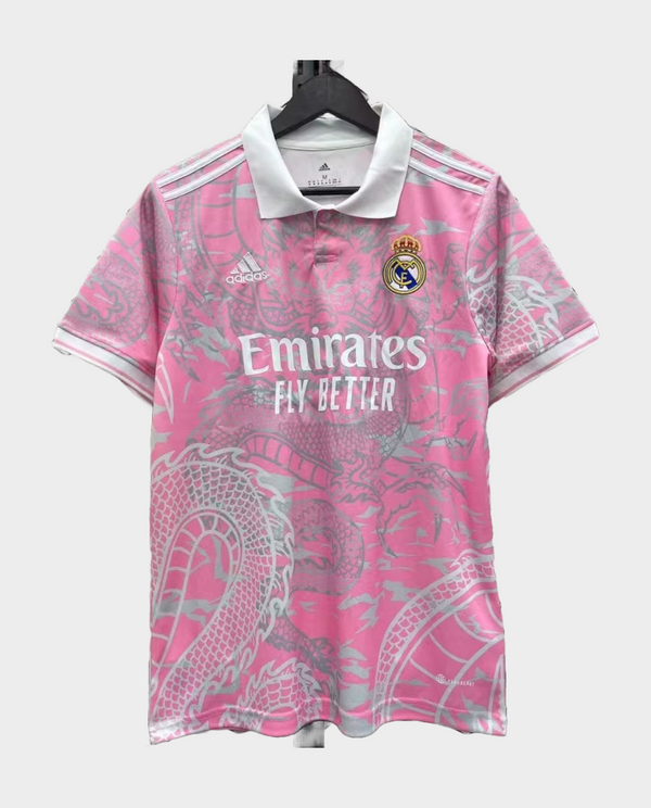 Real Madrid pink dragon jersey featuring a unique dragon design and embroidered team logo