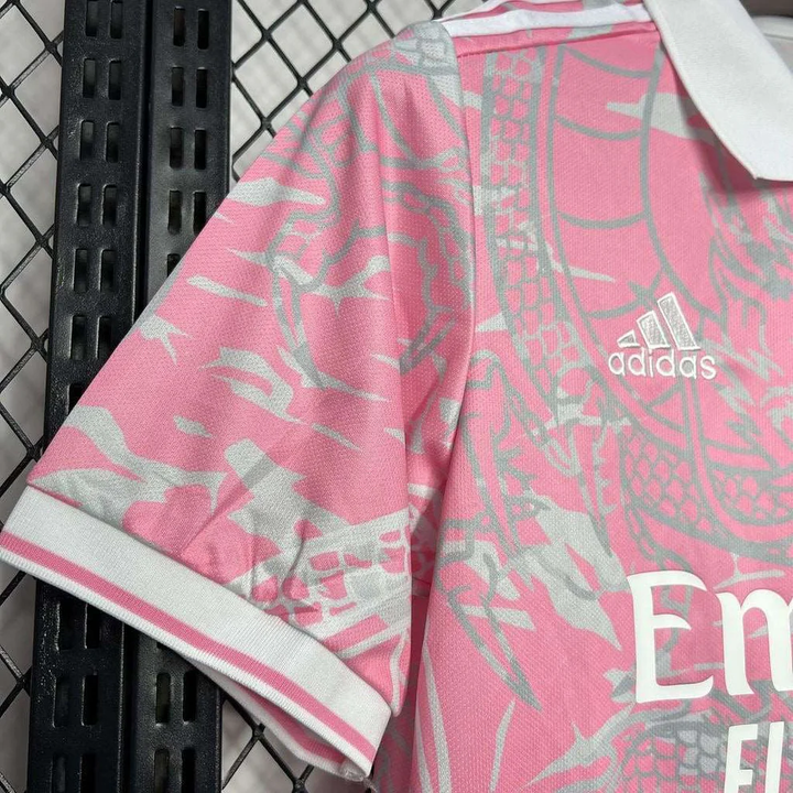 Real Madrid pink dragon jersey featuring unique dragon graphics and adidas logo on a lightweight fabric