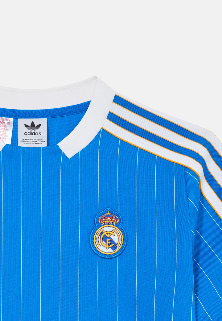 Striker Store Real Madrid terrace icon player version jersey with blue stripes and logo